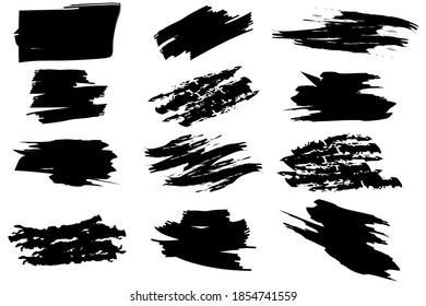 Black paint strokes in abstract style on white background. Watercolor brush texture. Stock image.