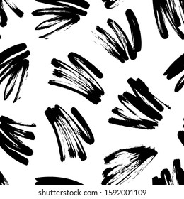 Black painted brush strokes seamless vector pattern. Black brushstrokes on a white background. Scribble smears wallpaper, wrapping paper, fabric. Modern ink illustration. Abstract rough texture. 