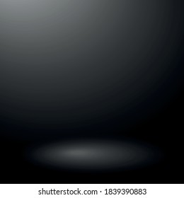 Black panoramic studio background with white glow