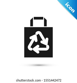 Black Paper shopping bag with recycle icon isolated on white background. Bag with recycling symbol.  Vector Illustration