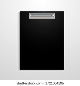 Black paper tablet without paper. A unique drawing of a paper tablet with a clip. Vector illustration. Stock Photo.