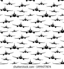 Black passenger aircraft isolated on white background. Front view. Monochrome seamless pattern. Vector simple flat graphic illustration. Texture.