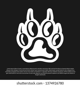 Black Paw print icon isolated on black background. Dog or cat paw print. Animal track. Vector Illustration