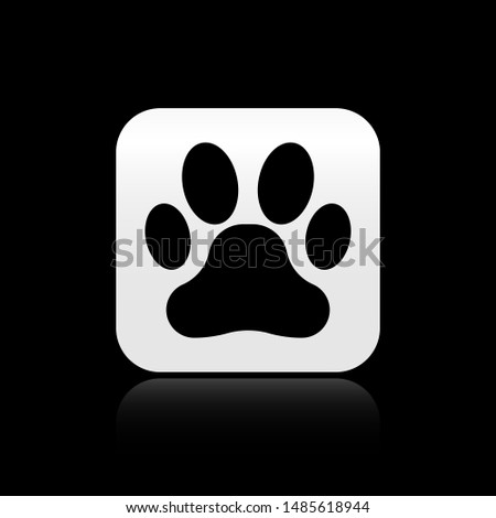 Black Paw print icon isolated on black background. Dog or cat paw print. Animal track. Silver square button. Vector Illustration