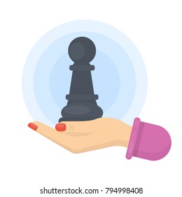 Black pawn in hand. Idea of strategy and risk.