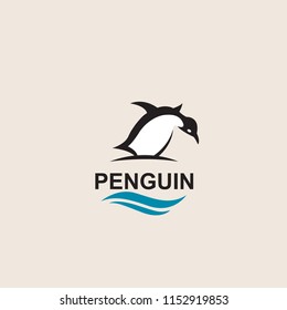 black penguin bird icon isolated with sea waves