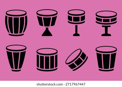 Black percussion instruments on pink background drums