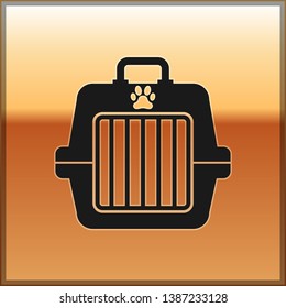 Black Pet carry case icon isolated on gold background. Carrier for animals, dog and cat. Container for animals. Animal transport box. Vector Illustration
