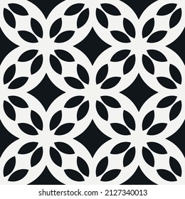 Black petals and rhombs. Vector seamless pattern simple shapes.