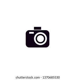 Black photo camera icon with white background 
