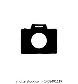 Black photo camera on a white background with flash and metal lens