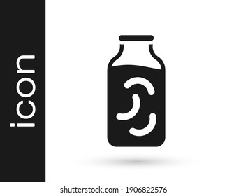 Black Pickled cucumbers in a jar icon isolated on white background.  Vector