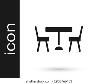 Black Picnic Table With Chairs On Either Side Of The Table Icon Isolated On White Background.  Vector