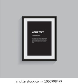 Black picture frame isolated on gray. Vector realistic design element.