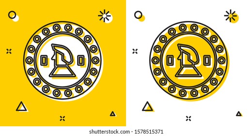 Black Pirate coin icon isolated on yellow and white background. Random dynamic shapes. Vector Illustration