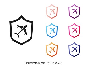 Black Plane with shield icon isolated on white background. Flying airplane. Airliner insurance. Security, safety, protection, protect concept. Set icons colorful. Vector
