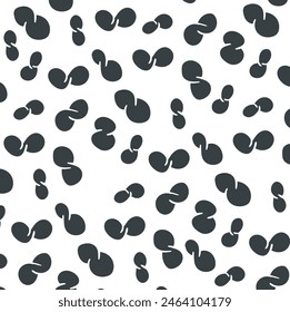 Black plump shapes or rounded spots with cutouts form texture. Small objects imitate coffee beans, or they look like hoof prints. 