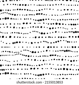 Black points vector seamless pattern. Hand drawn small dots texture background. Small circles in a row. Stylish doodle polka dot. Random scattered blots, abstract black and white background. 