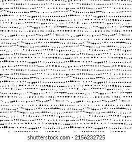Black points vector seamless pattern. Hand drawn small dots texture background. Small circles in a row. Stylish doodle polka dot. Random scattered blots, abstract black and white background. 