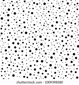 Black polka dots seamless pattern on white background.