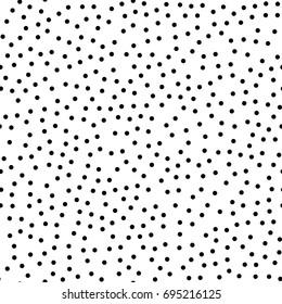 Black polka dots seamless pattern on white background.