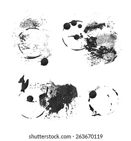 Black prints and smears of thick paint on  white paper
