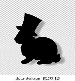 Black profile silhouette of fluffy rabbit or hare wearing magic cylinder top hat sitting  isolated on transparent background. illustration, icon, logo, clip art. 