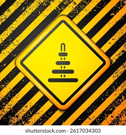 Black Pyramid toy icon isolated on yellow background. Warning sign. Vector
