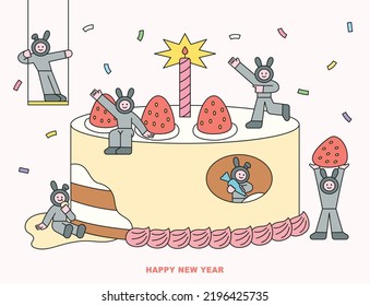 Black rabbits, the symbol of 2023, are making a huge celebration cake. flat design style vector illustration.