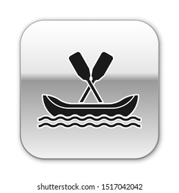 Black Rafting boat icon isolated on white background. Kayak with paddles. Water sports, extreme sports, holiday, vacation, team building. Silver square button. Vector Illustration