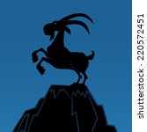 Black Ram Monochrome On Top Of A Mountain Peak On Blue Background