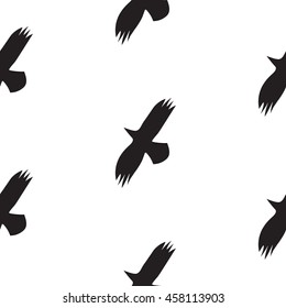 Black raven birds seamless vector pattern in scandinavian style. Crow flight silhouettes on white background. Minimalist style textile fabric wildlife ornament.