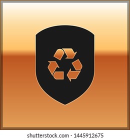 Black Recycle symbol inside shield icon isolated on gold background. Eco protection sign. Vector Illustration