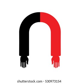 Black and red horseshoe magnet with human hands.Metaphor of attraction.