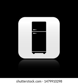 Black Refrigerator icon isolated on black background. Fridge freezer refrigerator. Household tech and appliances. Square button vector Illustration