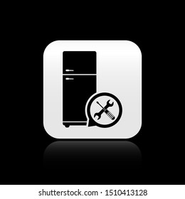 Black Refrigerator with screwdriver and wrench icon isolated on black background. Adjusting, service, setting, maintenance, repair, fixing. Silver square button. Vector Illustration
