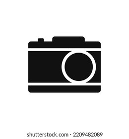 Black retro camera icon. Film and electronic device for professional photographers with zoom lens and vector shutter button