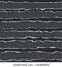 Black ripped blank horizontal note paper strips for text or message stuck on dark background