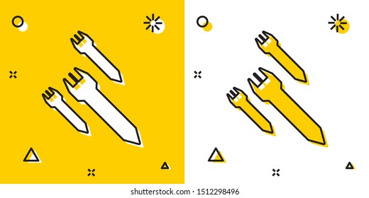 Black Rocket icon isolated on yellow and white background. Random dynamic shapes. Vector Illustration