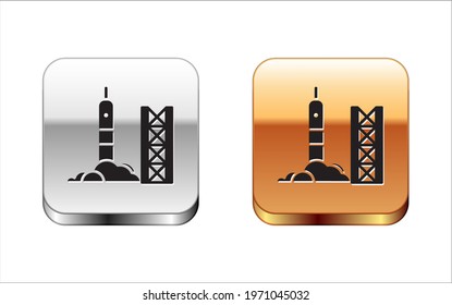 Black Rocket launch from the spaceport icon isolated on white background. Launch rocket in space. Silver-gold square button. Vector Illustration