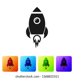 Black Rocket ship with fire icon isolated on white background. Space travel. Set icon in color square buttons. Vector Illustration