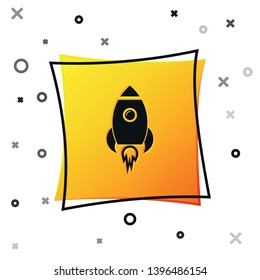 Black Rocket ship with fire icon isolated on white background. Space travel. Yellow square button. Vector Illustration