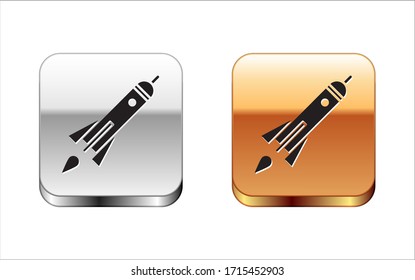 Black Rocket ship with fire icon isolated on white background. Space travel. Silver-gold square button. Vector Illustration