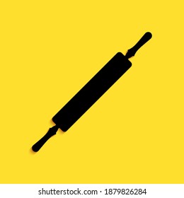 Black Rolling pin icon isolated on yellow background. Long shadow style. Vector.