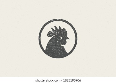 Black rooster head silhouette for poultry farm industry hand drawn stamp effect vector illustration. Vintage grunge texture emblem for butchery packaging and menu design or label decoration