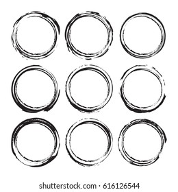 Black round abstract backgrounds smears vector objects isolated on a white background. Grunge shapes. Circle frames