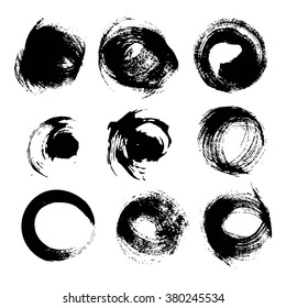 Black round textured strokes set isolated on a white background