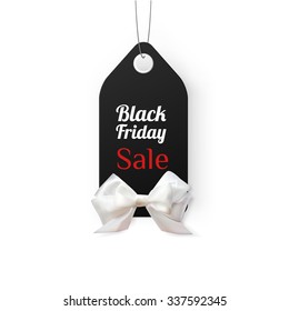 Black sale tag vector background for black friday sale with white gift bow. Vector eps10.