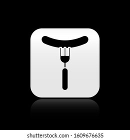 Black Sausage on the fork icon isolated on black background. Grilled sausage and aroma sign. Silver square button. Vector Illustration