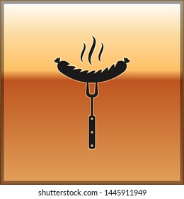 Black Sausage on the fork with steam icon isolated on gold background. Grilled sausage and aroma sign. Vector Illustration